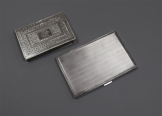 A Victorian silver card purse, Birmingham, 1868 and a George V silver cigarette case, largest 12.8cm.